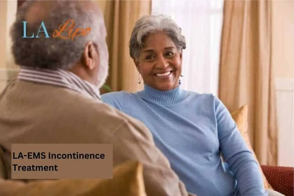Couple sat smiling at each other - LA-EMS treatment Sunbury