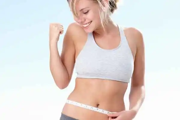 woman happy after fat reduction treatment Sunbury